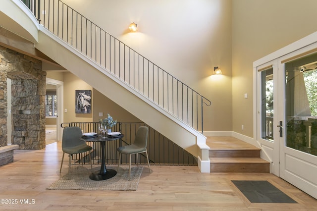 88 E Double Hitch, Eagle, CO 81631 - entrance foyer with a towering ceiling, wood finished floors, and stairway