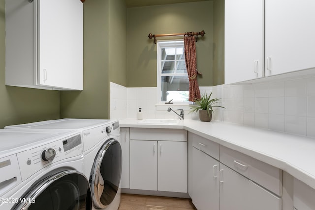 88 E Double Hitch, Eagle, CO 81631 - washroom featuring washing machine and clothes dryer, cabinet space, and light wood-type flooring