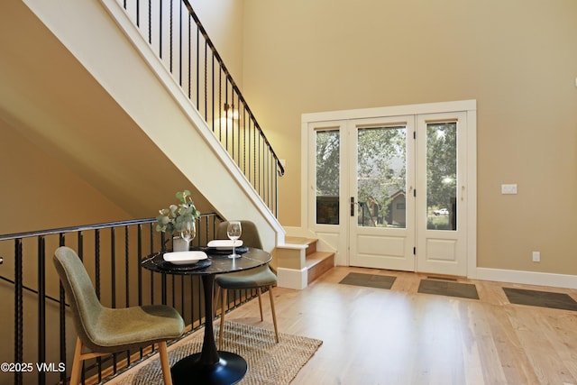 88 E Double Hitch, Eagle, CO 81631 - entrance foyer featuring wood finished floors, a towering ceiling, and stairs