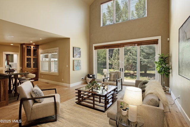 88 E Double Hitch, Eagle, CO 81631 - living room featuring a towering ceiling, light wood finished floors, and recessed lighting