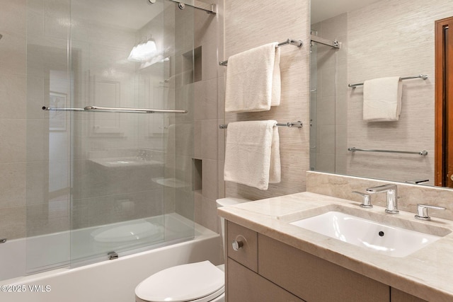 355 Offerson Rd Unit P4, Beaver Creek, CO 81620 - bathroom with vanity, combined bath / shower with glass door, and tile walls