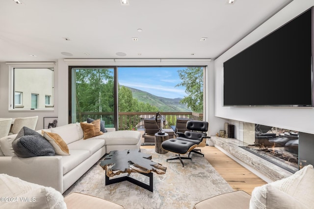 784 Potato Patch Dr Unit W, Vail, CO 81657 - living room featuring floor to ceiling windows and wood finished floors