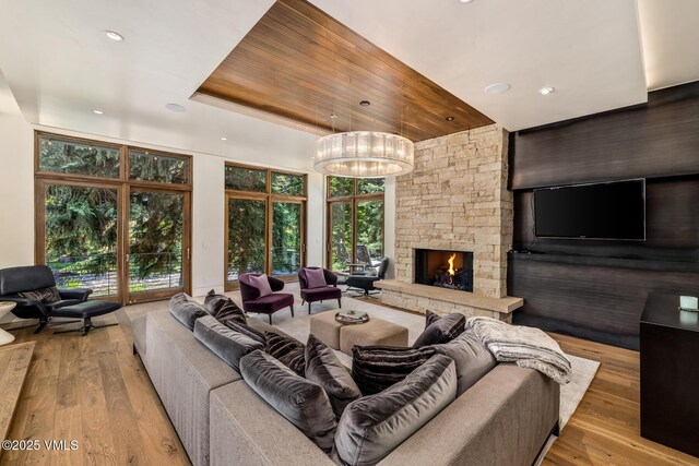 2764 S Frontage Rd, Vail, CO 81657 - living room with wood-type flooring, wood ceiling, a fireplace, and recessed lighting