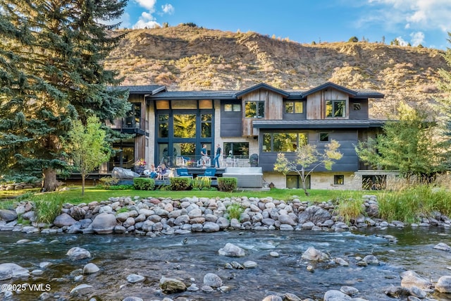 2764 S Frontage Rd, Vail, CO 81657 - contemporary home with a deck with mountain view