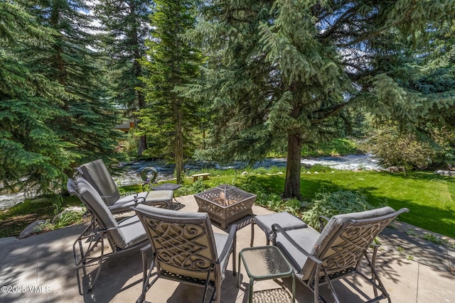 2764 S Frontage Rd, Vail, CO 81657 - view of patio featuring a fire pit