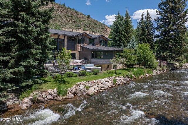 2764 S Frontage Rd, Vail, CO 81657 - back of house with a water and mountain view