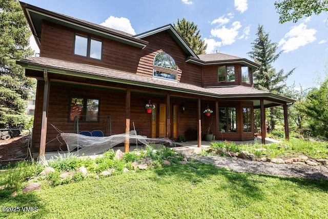336 E Fourth St, Eagle, CO 81631 - rustic home featuring a front lawn and covered porch