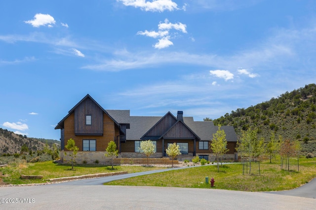 1092 Fourth Of July Rd, Eagle, CO 81631 - view of front of home featuring a front yard and stone siding