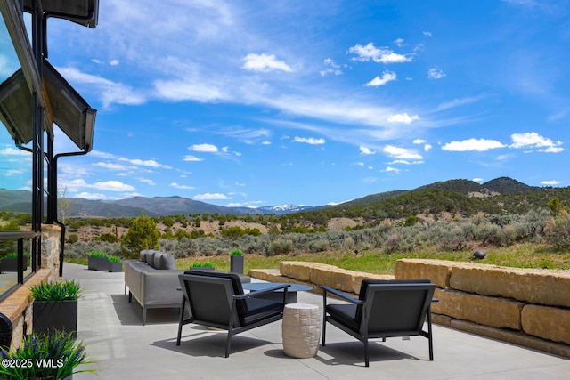 1092 Fourth Of July Rd, Eagle, CO 81631 - view of patio with a mountain view and outdoor lounge area