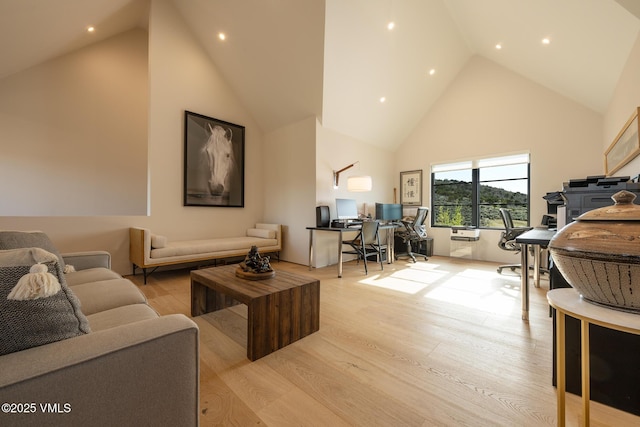 1092 Fourth Of July Rd, Eagle, CO 81631 - living room featuring high vaulted ceiling, an office area, light wood finished floors, and recessed lighting