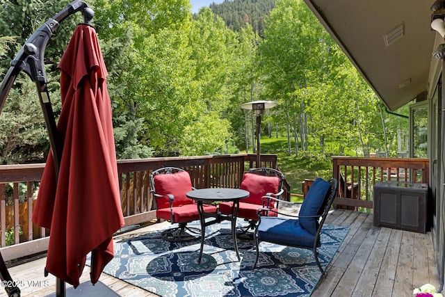 26 Lark Ct Unit B, Eagle-Vail, CO 81620 - wooden deck with a forest view