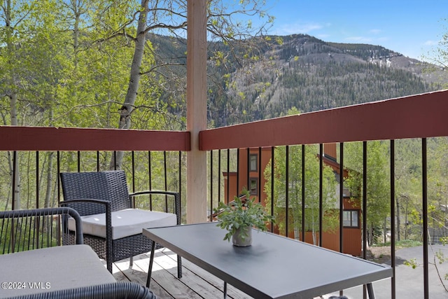 deck featuring a mountain view