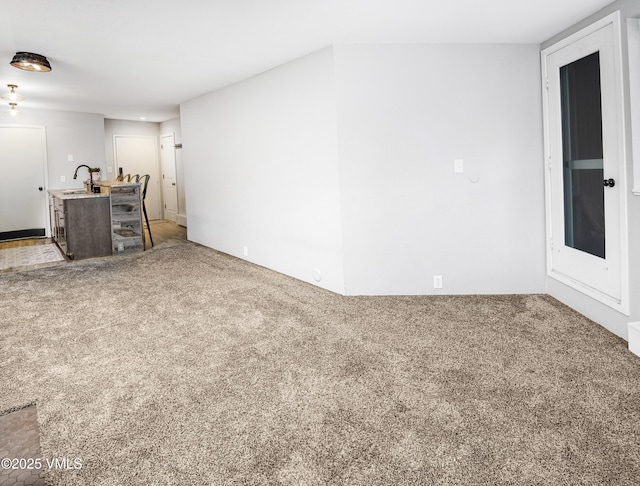 3971 Big Horn Rd Unit 7-N, Vail, CO 81657 - unfurnished living room with light colored carpet and a sink