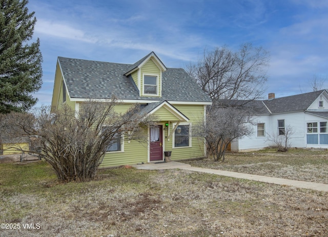 425 Broadway St, Eagle, CO 81631 - cape cod-style house with roof with shingles