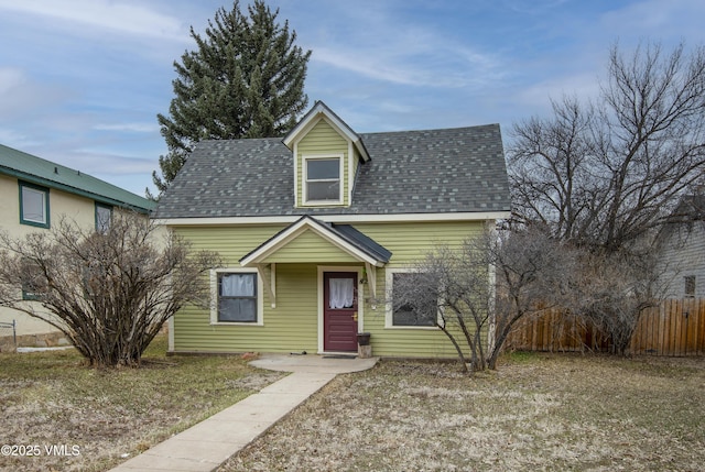 425 Broadway St, Eagle, CO 81631 - view of front of home with a shingled roof and fence