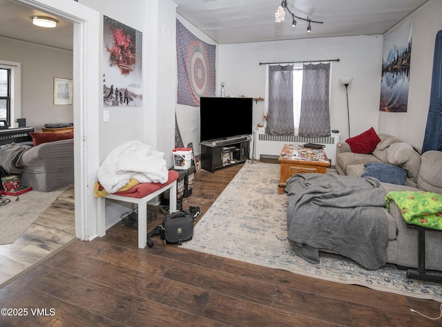 425 Broadway St, Eagle, CO 81631 - living area with radiator and wood-type flooring