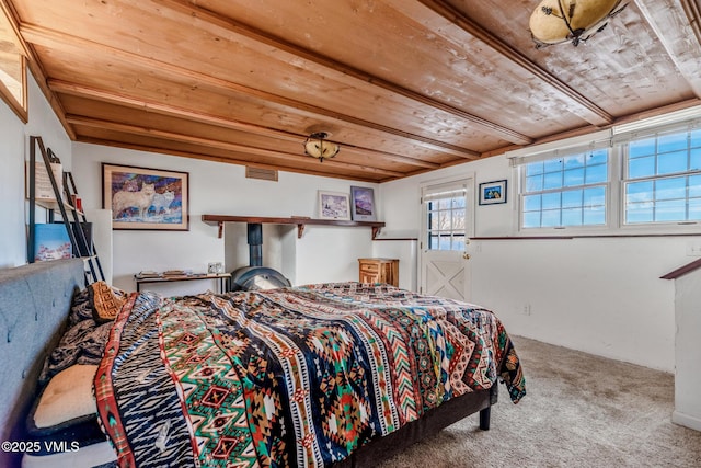 bedroom featuring wooden ceiling, carpet flooring, and visible vents