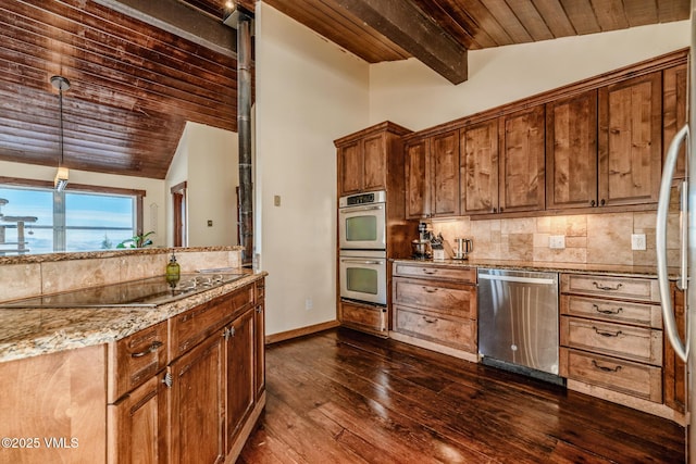 kitchen with lofted ceiling with beams, light stone counters, wooden ceiling, appliances with stainless steel finishes, and backsplash