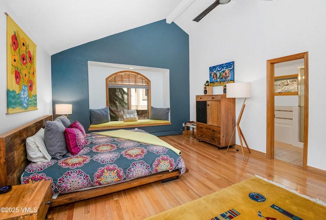 1460 Buffehr Creek Rd Unit C, Vail, CO 81657 - bedroom featuring wood finished floors, high vaulted ceiling, beam ceiling, and baseboards