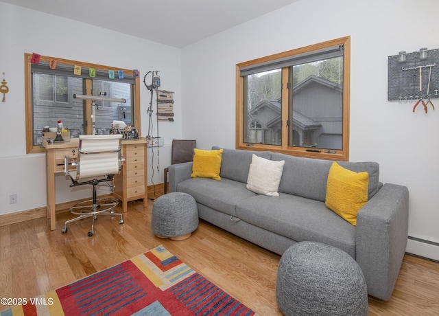 1460 Buffehr Creek Rd Unit C, Vail, CO 81657 - office with wood finished floors, baseboards, and a baseboard heating unit