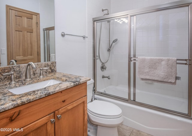 1460 Buffehr Creek Rd Unit C, Vail, CO 81657 - bathroom featuring vanity, enclosed tub / shower combo, and toilet