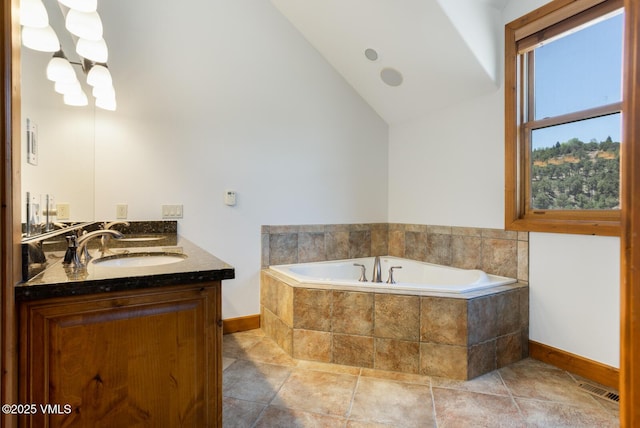 416 Eby Creek Rd, Eagle, CO 81631 - bathroom with a garden tub, double vanity, and vaulted ceiling