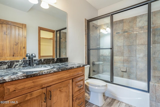 416 Eby Creek Rd, Eagle, CO 81631 - bathroom with vanity, bath / shower combo with glass door, and wood finished floors