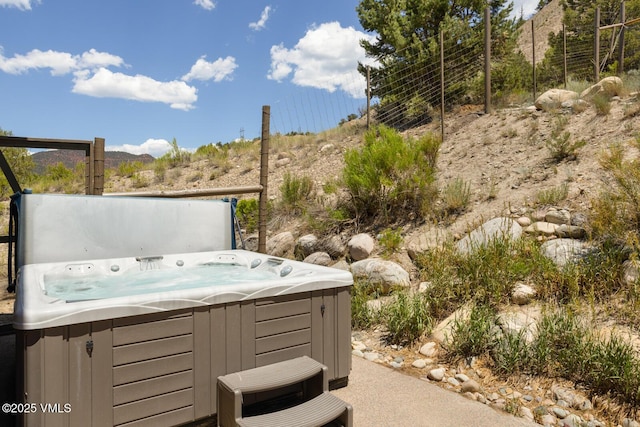 416 Eby Creek Rd, Eagle, CO 81631 - view of patio / terrace featuring a hot tub and a mountain view