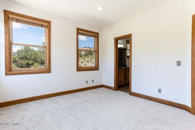 416 Eby Creek Rd, Eagle, CO 81631 - carpeted empty room featuring baseboards and recessed lighting