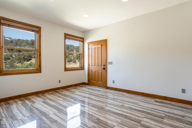 416 Eby Creek Rd, Eagle, CO 81631 - empty room with healthy amount of natural light and recessed lighting
