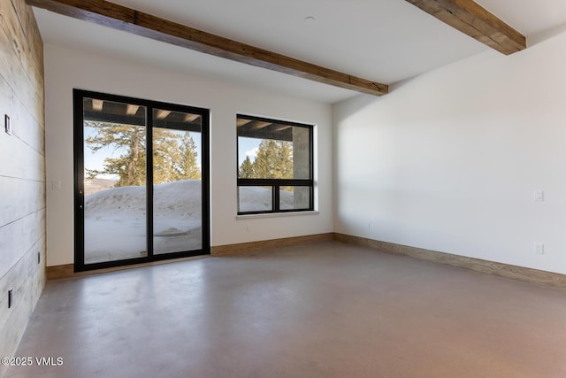 181 Black Bear Trl, Edwards, CO 81632 - spare room with concrete floors, beamed ceiling, and baseboards