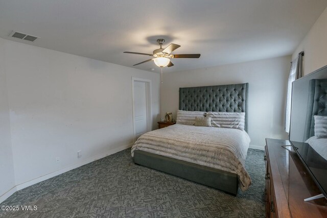 carpeted bedroom with visible vents, ceiling fan, and baseboards