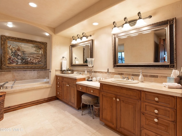 140 Elk Woods Rd, Edwards, CO 81632 - bathroom featuring double vanity, a garden tub, recessed lighting, and tile patterned flooring