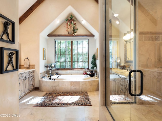 140 Elk Woods Rd, Edwards, CO 81632 - bathroom featuring vanity, a garden tub, beamed ceiling, high vaulted ceiling, and recessed lighting