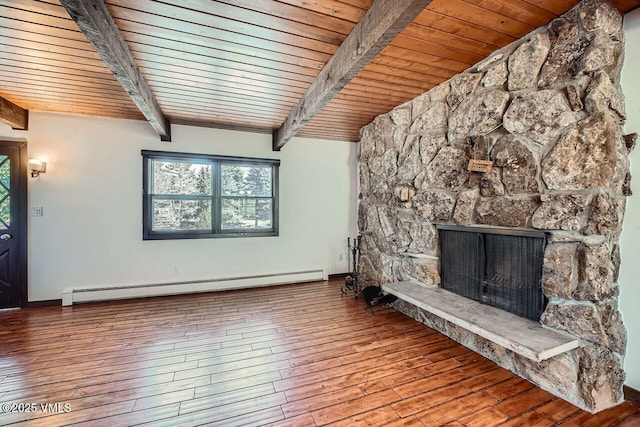 unfurnished living room with wood finished floors, baseboard heating, wooden ceiling, and beamed ceiling