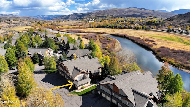 aerial view with a residential view and a water and mountain view