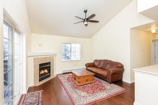 living room with a ceiling fan, dark wood-style floors, baseboards, a baseboard radiator, and a fireplace