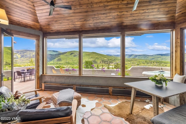 767 Charolais Cir, Edwards, CO 81632 - sunroom with ceiling fan, outdoor dining space, vaulted ceiling, a mountain view, and tile patterned floors