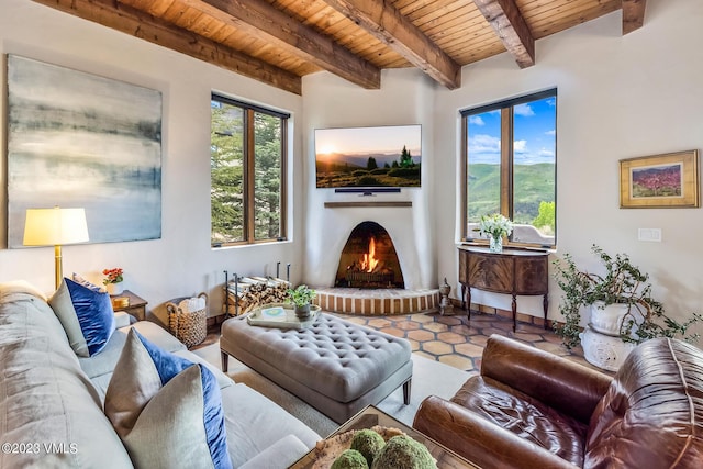 767 Charolais Cir, Edwards, CO 81632 - living area with a wooden ceiling with exposed beams and a warm lit fireplace
