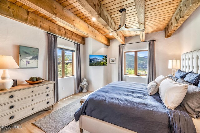 767 Charolais Cir, Edwards, CO 81632 - bedroom featuring a wood ceiling with exposed beams and light wood-style floors