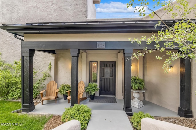 767 Charolais Cir, Edwards, CO 81632 - doorway to property featuring a porch and stucco siding