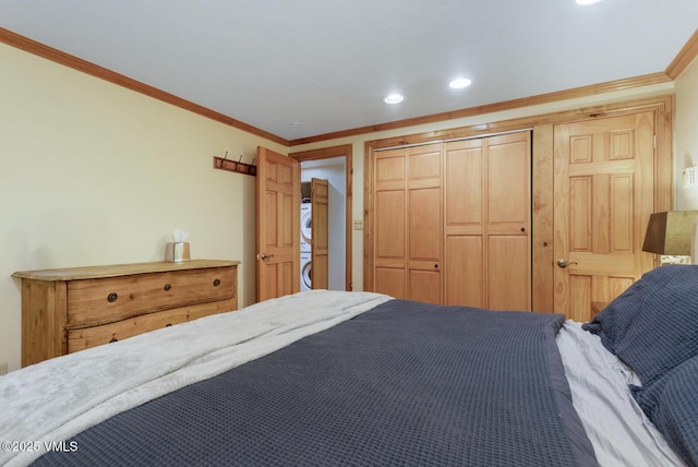 2821 Basingdale Blvd Unit 4, Vail, CO 81657 - bedroom featuring stacked washer / dryer, crown molding, a closet, and recessed lighting