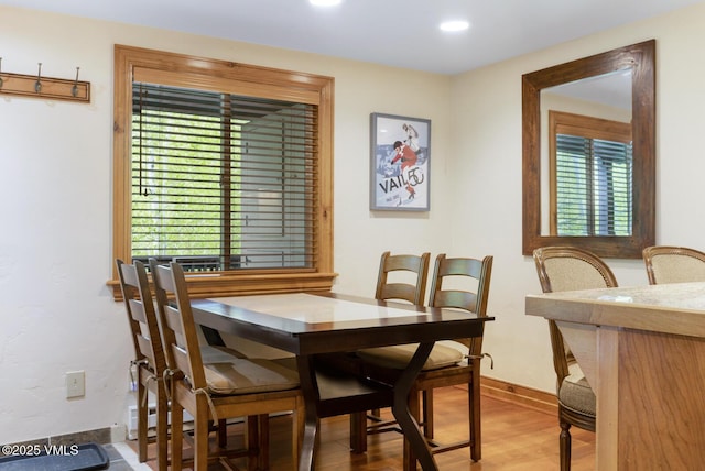2821 Basingdale Blvd Unit 4, Vail, CO 81657 - dining area featuring wood finished floors, baseboards, and recessed lighting