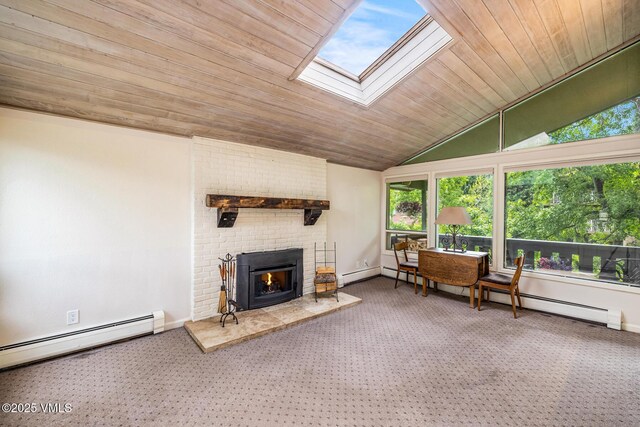 929 Red Sandstone Rd Unit 15D, Vail, CO 81657 - sunroom featuring a baseboard heating unit, vaulted ceiling, and a skylight