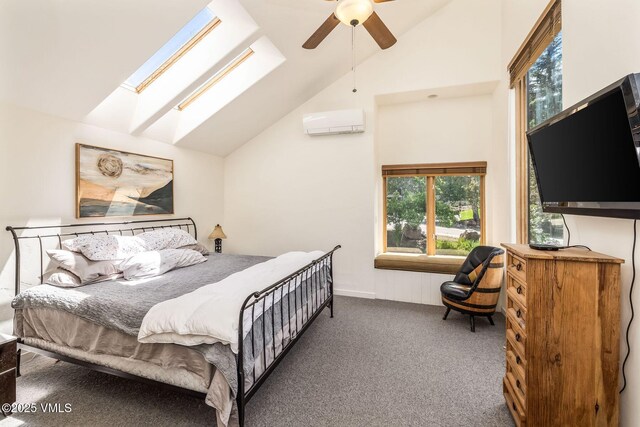 960 June Creek Rd, Edwards, CO 81632 - carpeted bedroom with a wall mounted AC, vaulted ceiling, a skylight, and ceiling fan