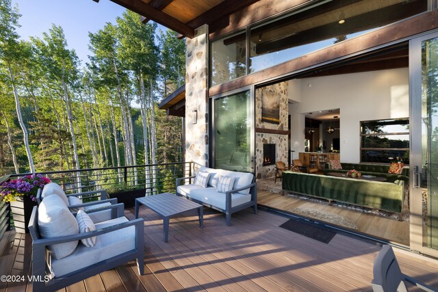 deck featuring outdoor lounge area