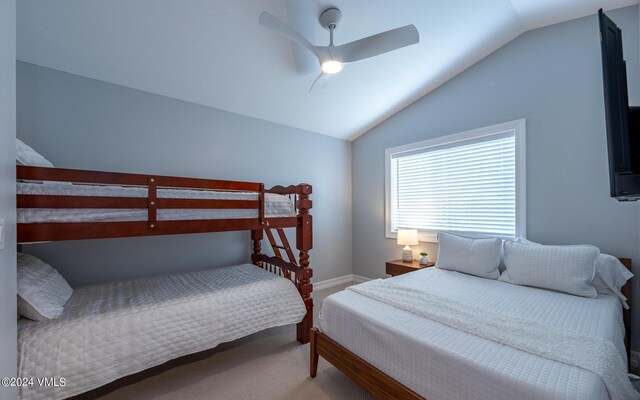 bedroom featuring lofted ceiling and ceiling fan