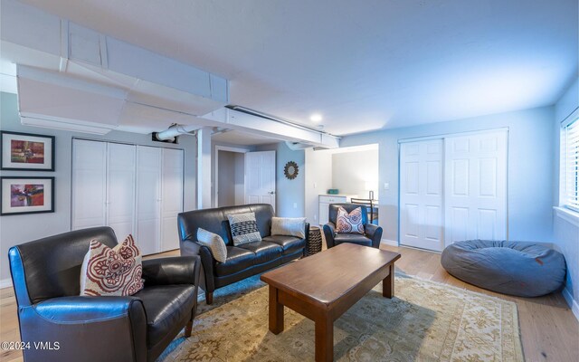 living room with light hardwood / wood-style floors