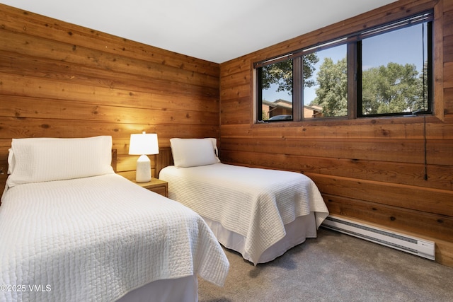 54 Columbine Cir Unit 14, Eagle-Vail, CO 81620 - carpeted bedroom with a baseboard heating unit and wooden walls