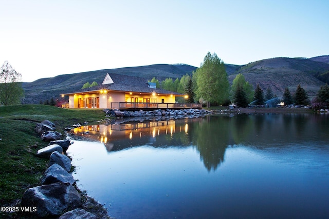 54 Columbine Cir Unit 14, Eagle-Vail, CO 81620 - water view featuring a mountain backdrop